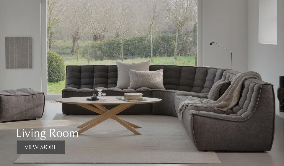 gray sofa with coffee table center